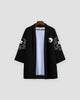 Front of the open black haori with a small yin-yang on the left panel and cloud art on the sleeves