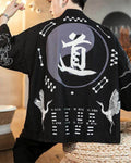 Man in the black 道 haori seen from behind with his arms raised