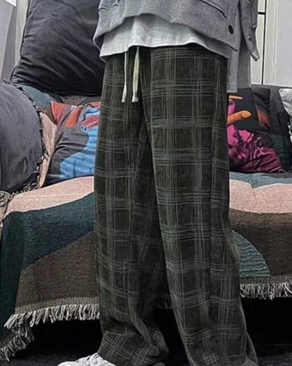 Army green plaid wide-leg pants worn standing, knee to ankle