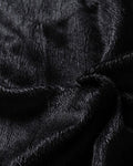 Close-up of the black short plush lining inside the biker jacket
