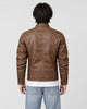 Back of the brown biker jacket on a model, showing the quilted shoulders, centre seam and quilted lower band