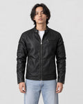 Model wearing the black PU leather biker jacket over a white tee with light jeans, front view