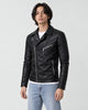 Man in a black leather-look biker jacket with an asymmetric zip over a white tee, three-quarter view