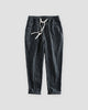 Black striped cropped pants with a cream drawstring and turned-up cuffs, flat view