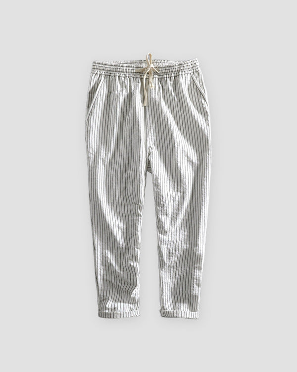White striped cropped pants with a cream drawstring and turned-up cuffs, flat view