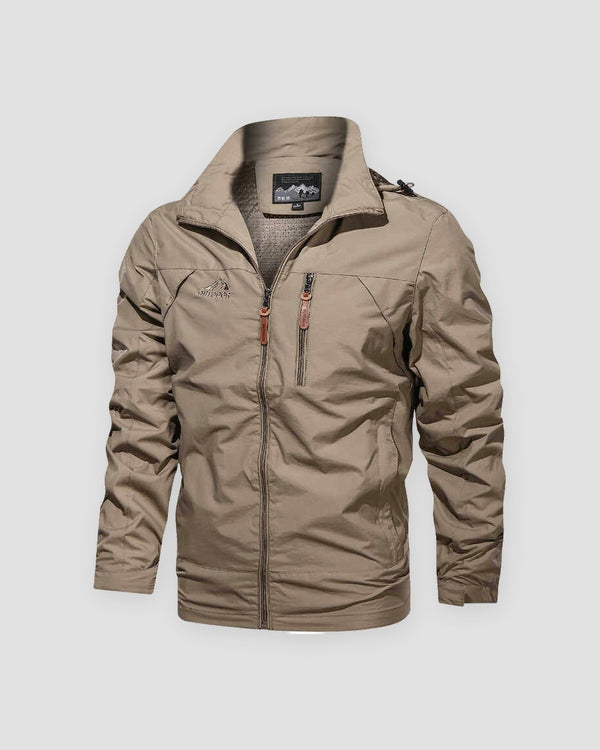 Khaki windbreaker jacket with a stand collar, a chest zip pocket and brown leather-look zip pulls, front view