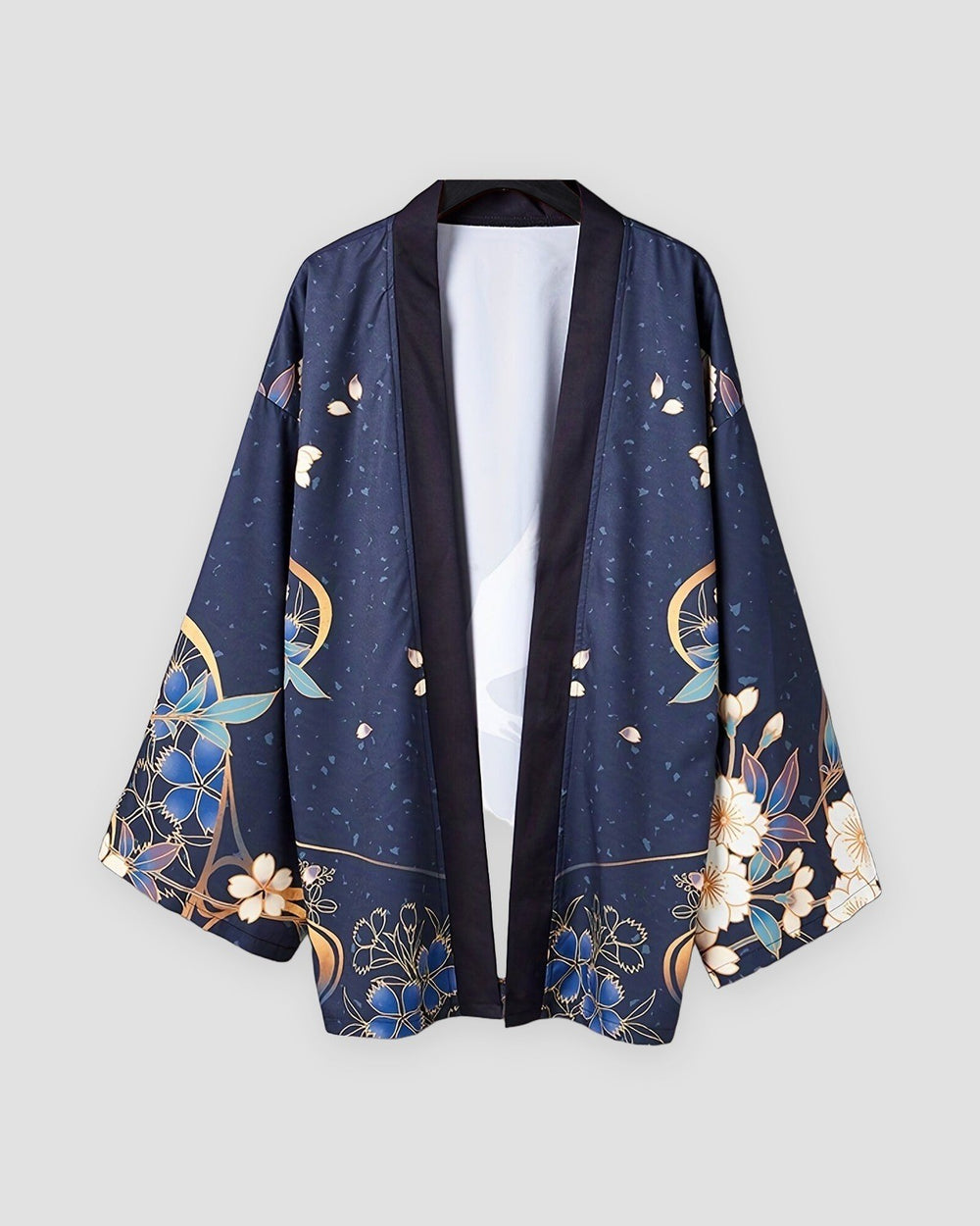 Dark navy haori jacket on a hanger, open front with a dark band and blue and cream flowers with gold lines at the hem