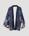 Dark navy haori jacket on a hanger, open front with a dark band and blue and cream flowers with gold lines at the hem