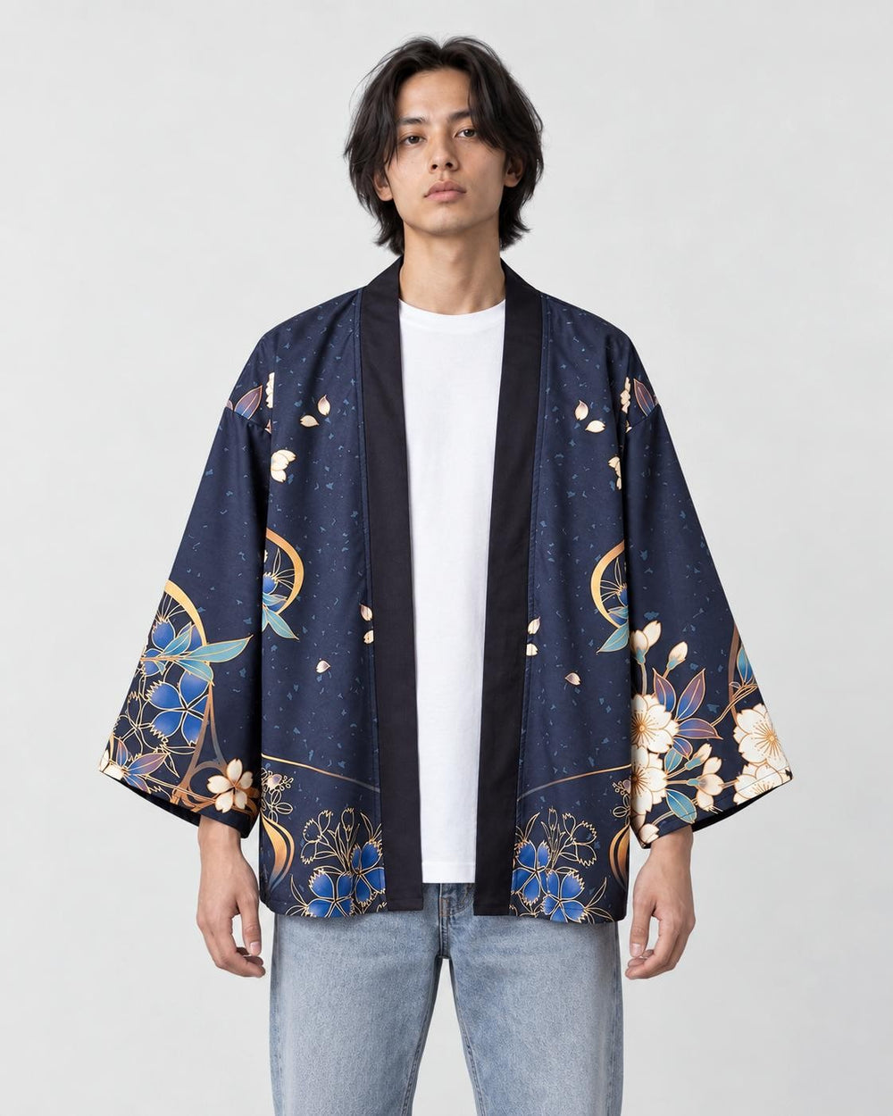 Man in the open dark navy haori with blue and cream flowers at the cuffs, a white tee and light jeans, front view