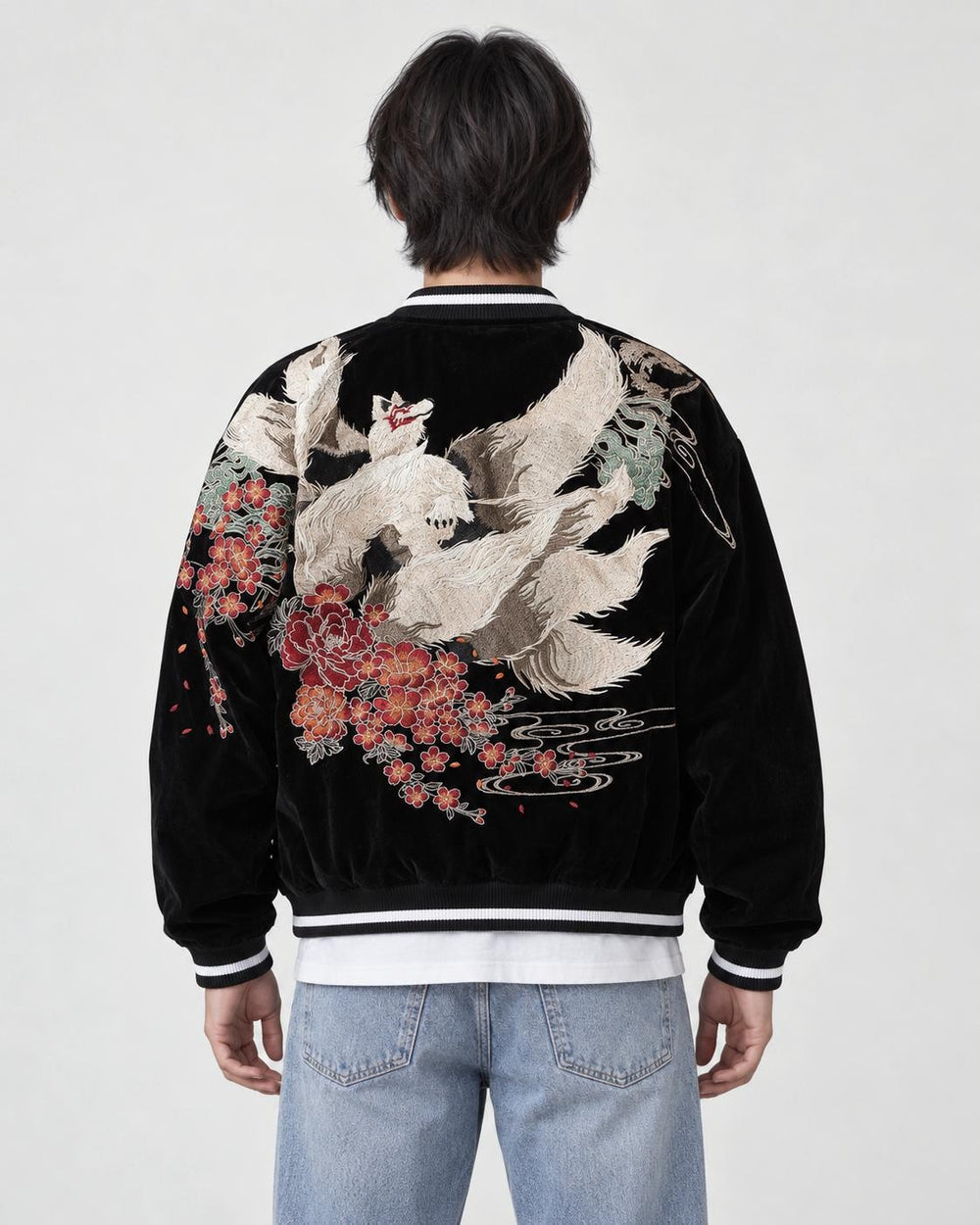 Model wearing the black kitsune sukajan, back view of the fox embroidery