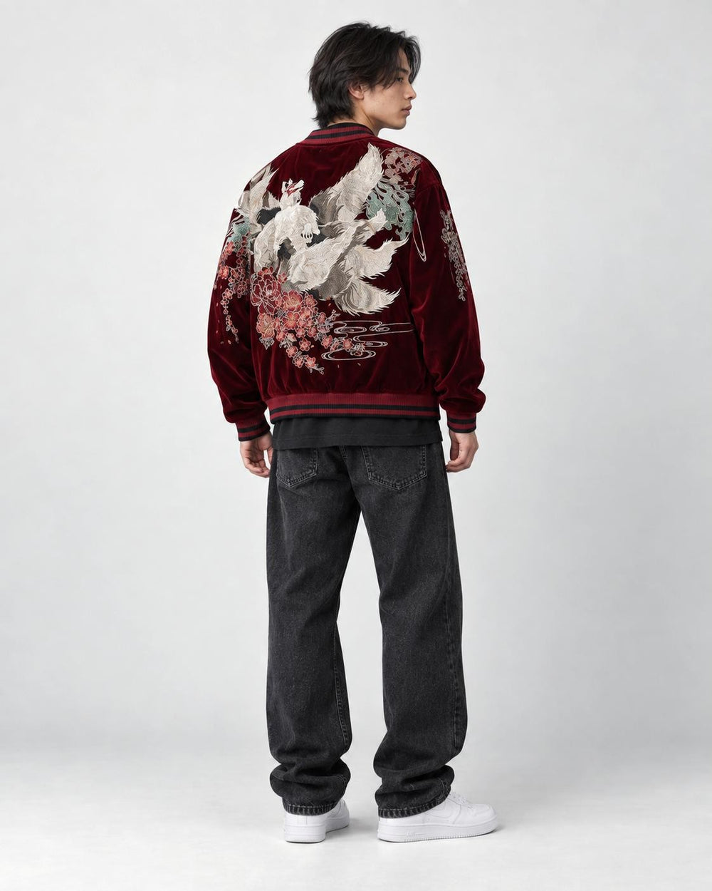 Model wearing the wine red kitsune sukajan, three-quarter back view