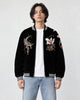 Model wearing the black kitsune sukajan open, front view of the fox head