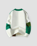 Green patchwork cable knit sweater, back view