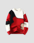 Red patchwork cable knit sweater, front view, red, black and beige patches on cream