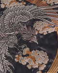 Close-up of the silver phoenix and gold cloud embroidery