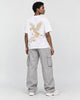 Model wearing the white phoenix embroidered T-shirt, back view over the shoulder