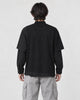 Model wearing the pinstripe layered sweatshirt, back view