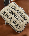 Close-up of the chenille LEMANISM patch