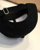 Close-up of the strap and metal slider at the back