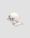White plum blossom embroidered baseball cap with a black-stitched branch