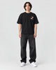 Model wearing the black plum blossom T-shirt, front view
