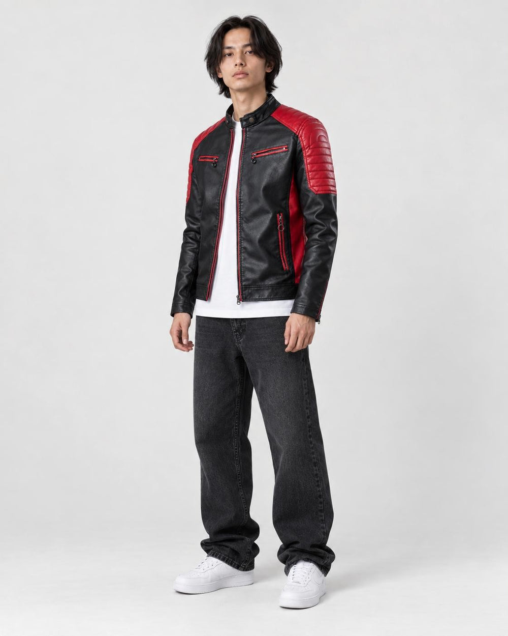 Model wearing the black and red PU leather moto jacket, three-quarter view