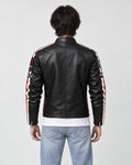 Model wearing the black racing patch moto jacket, back view