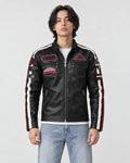 Model wearing the black racing patch moto jacket over a white tee, front view