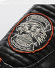 Close-up of the round embroidered eagle badge on the sleeve