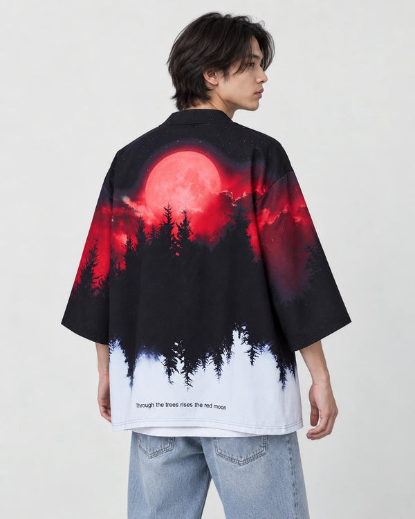 Man in the haori seen from behind at an angle, a red moon over black pines fading to white at the hem, over a white tee