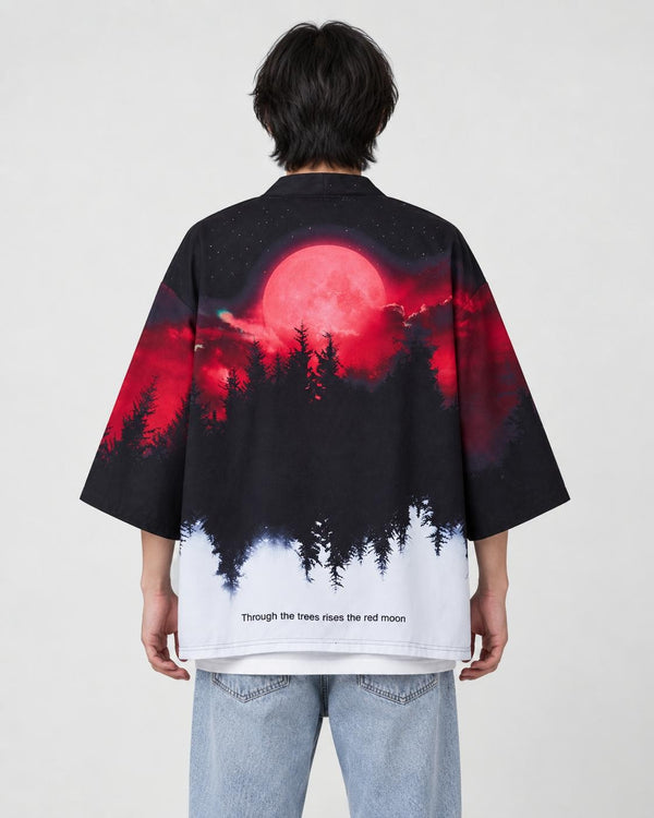 Man seen from behind in the haori printed with a red moon over a black pine forest fading to white, over a white tee