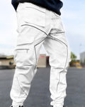 White cargo joggers with gray tape lines and large flap pockets