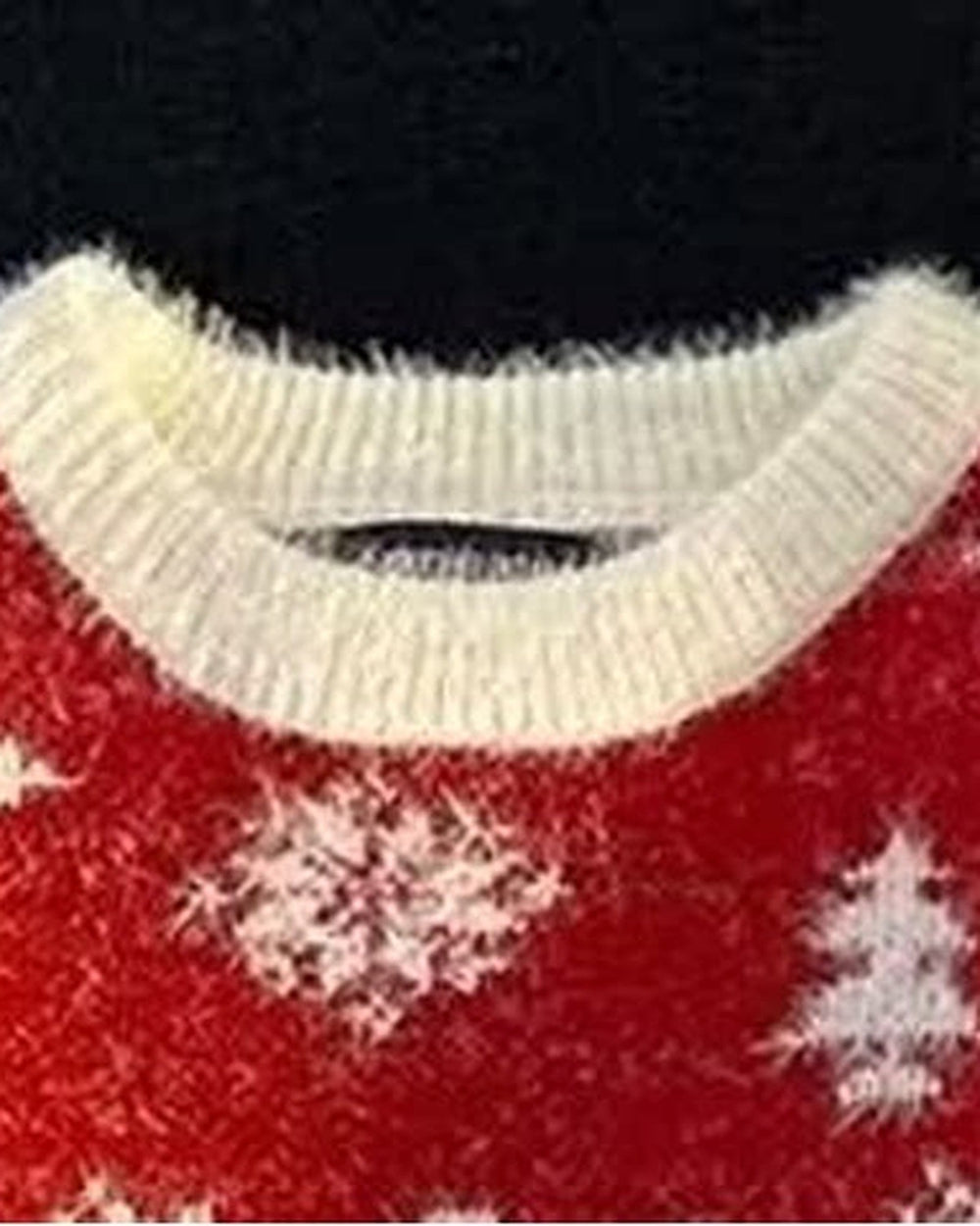 Close-up of the snowflakes and trees on the red yoke