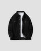 Black relaxed denim trucker jacket, front view, open over a white tee