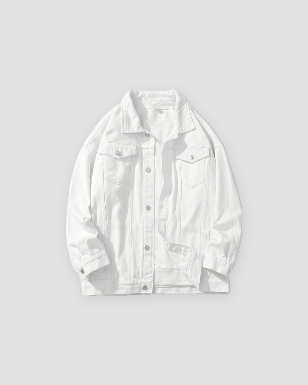 White relaxed denim trucker jacket, front view