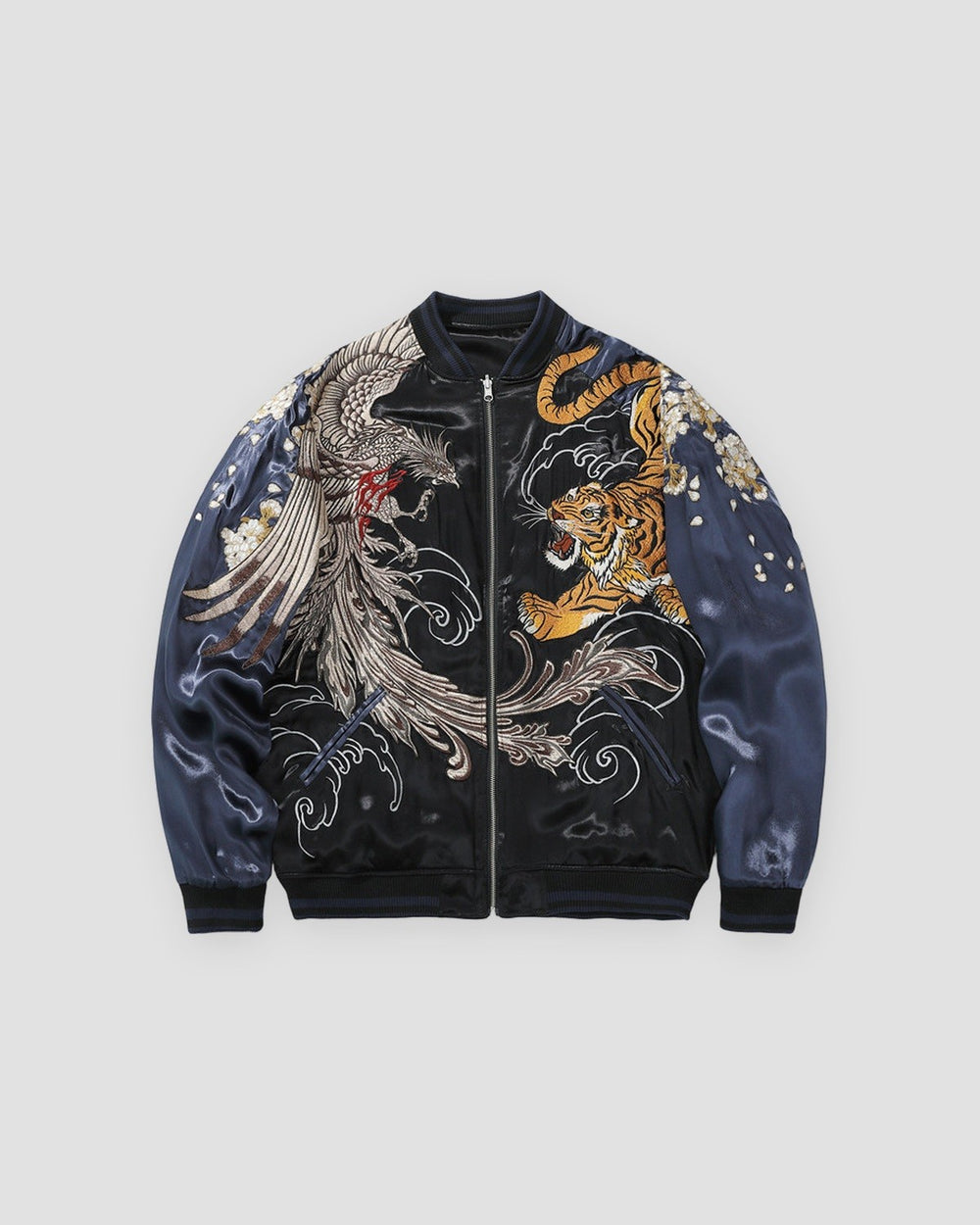 Black souvenir jacket with navy sleeves, a silver phoenix on the left chest and an orange tiger on the right chest