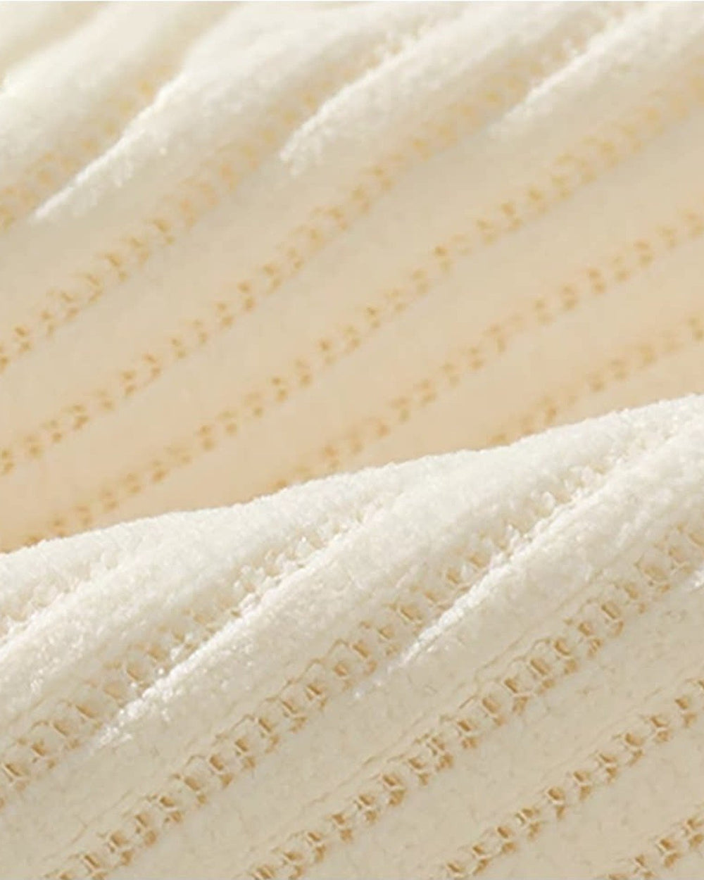 Close-up of the fine vertical ribs of the corduroy fabric