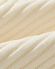 Close-up of the fine vertical ribs of the corduroy fabric