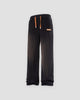 Black ribbed corduroy wide-leg pants with a tan drawcord and a tan tag at the left hip