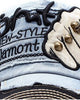 Close-up of the embroidered fist patch and metal rivets