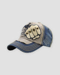 Gray and navy distressed cap with a riveted fist patch