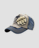 Gray and navy distressed cap with a riveted fist patch