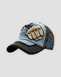 Light blue and black distressed cap with a riveted fist patch