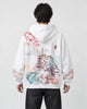Model wearing the white sakura tower hoodie, back view of the print
