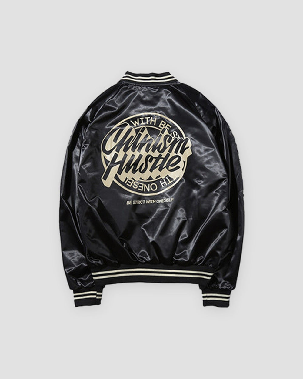 Black bomber jacket with a large round cream script badge on the back, back view