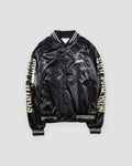 Black satin-like bomber jacket with cream sleeve lettering and striped rib trims, front view