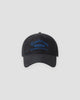 Black washed dad cap with blue script embroidery, front view