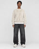 Model wearing the cream shaggy knit sweater, front view