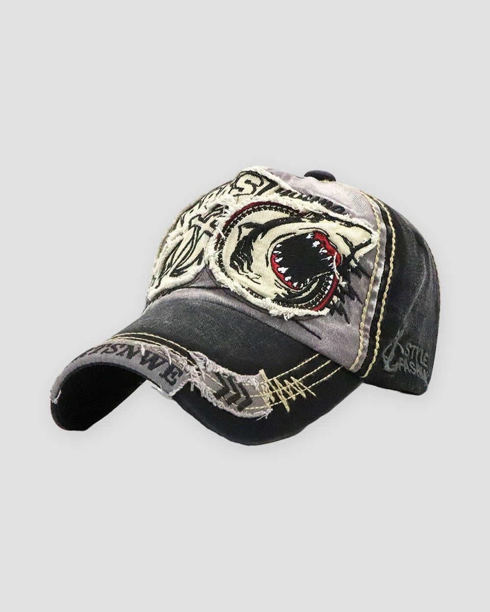 Dark gray shark patch baseball cap, three-quarter view