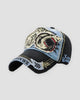 Denim blue shark patch baseball cap, three-quarter view, black crown and light blue panel
